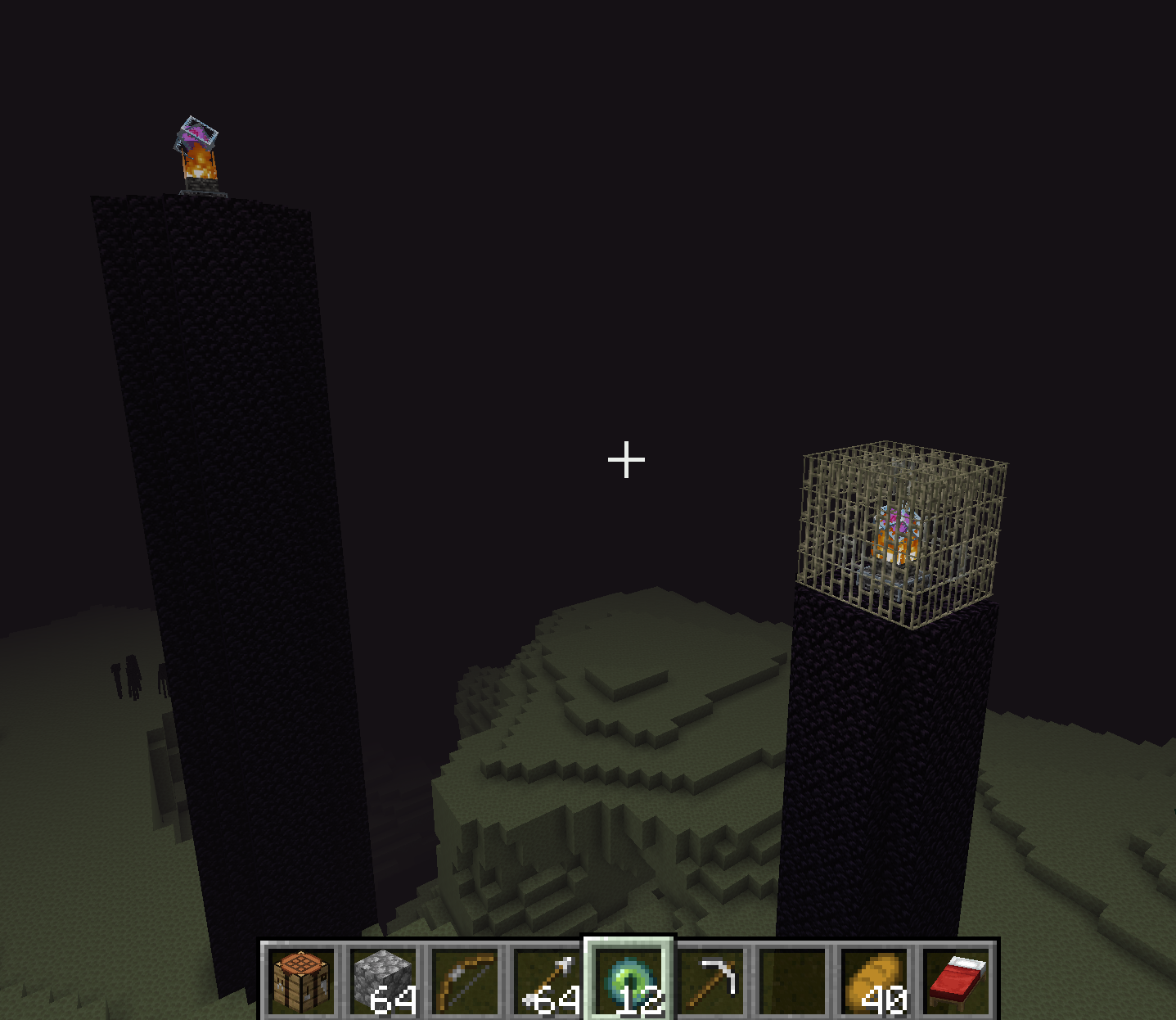 An end crystal on a pillar, one exposed and one enclosed in an iron bar cage
