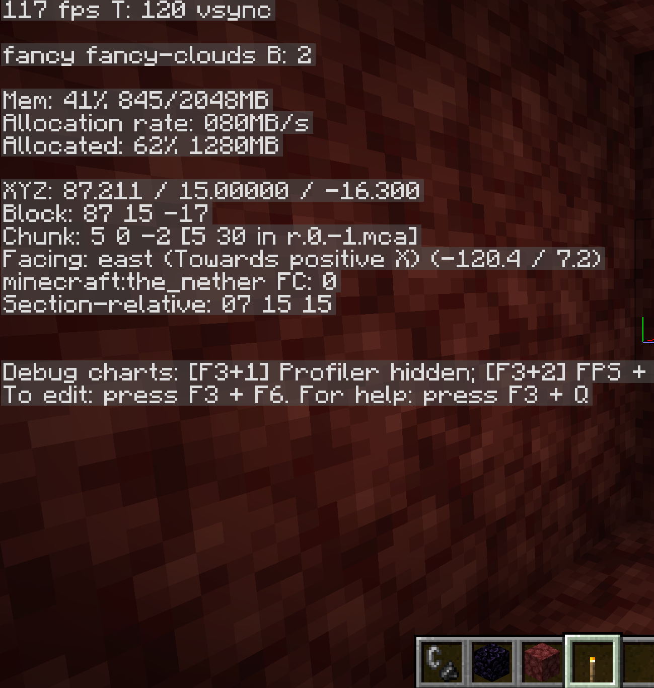 F3 debug screen showing Y-15 in the Nether